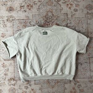 DAILY DRILLS reversible green sweatshirt top